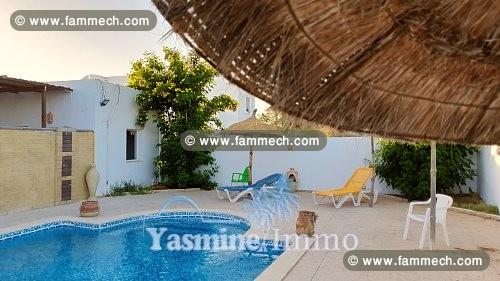 Maison de vacances avec piscine commune