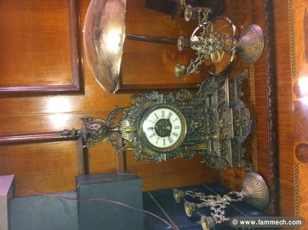 pendule avec 2 chandelier ,en état de marche 