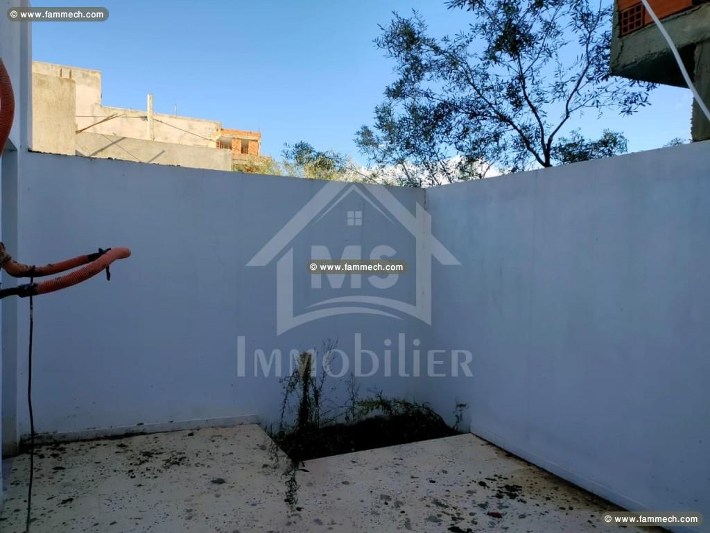Un appartement RDC avec garage et jardin à vendre 