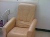 chaise en cuir beige Avec un repose Pied