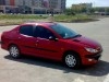 206 sedan rouge, de femme