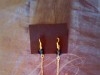 Boucles d'oreilles plumes couleurs différentes 