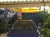 Dame vend 206 Sedan bleu éléctrique oct 2008 