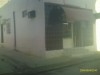 MAISON FAISANT LE COIN AVEC UN LOCAL
