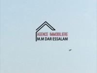 maison style américain près de la mer