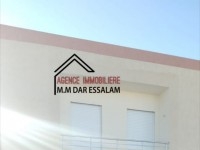 maison style américain près de la mer