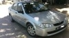 Mazda 323 ancienne voiture diplomatique