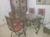 table fer forgé avec 4 chaises