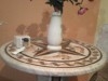 Table ronde en marbre mosaïque