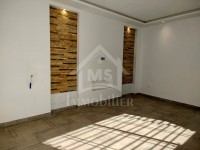 Un appartement RDC avec garage et jardin à vendre 