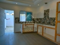 Un appartement RDC avec garage et jardin à vendre 