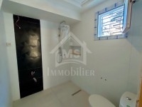 Un appartement RDC avec garage et jardin à vendre 