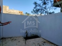Un appartement RDC avec garage et jardin à vendre 