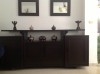 un joli buffet avec deux miroirs