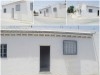 Une maison avec deux garages 
