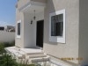 Villa S+3 , bien achevée, entourée d'un jardin